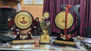 Awards and trophies received by Murti Packers and Movers Kolkata for excellence in packing and moving services at national IPG conferences.