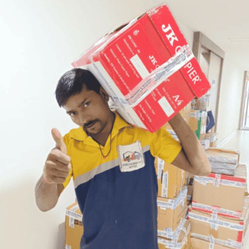 “Packers and movers in Kolkata staff carrying packed cartons for safe household shifting from Kolkata to Ranchi”